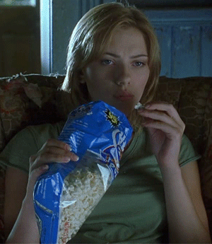 Scarlett Johansson eating popcorn