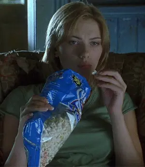 Scarlett Johansson eating popcorn