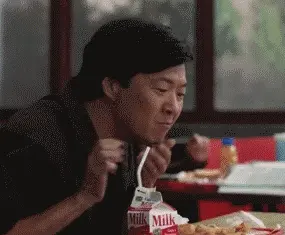 Mr Chang laughing and spitting milk