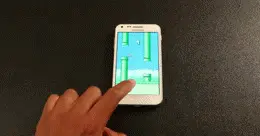 Smashing phone with hammer after playing Flappy Bird