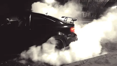 Race car burning rubber