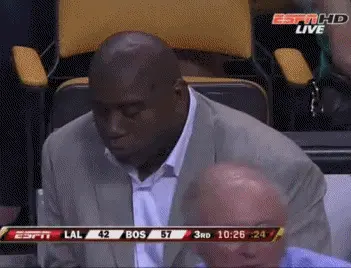 Magic Johnson eating popcorn