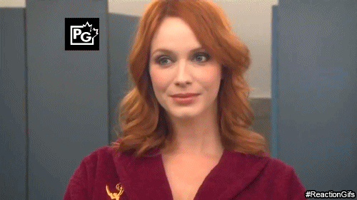 christina-hendricks-when-a-girl-sees-a-camera-posing-for-picture