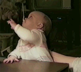 Baby reaction learning how spoons work